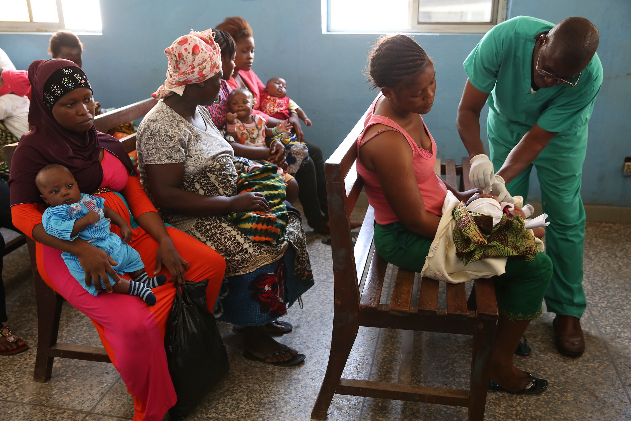 mothers and babies in clinic waiting room