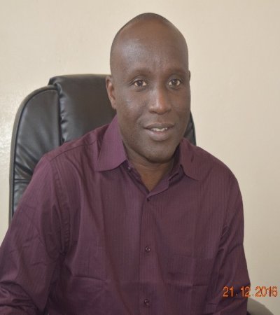 Professor Babacar Faye seated