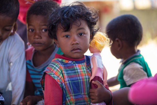 Photo of young children in colourful clothes