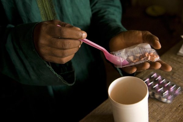 Photo of hands preparing medication